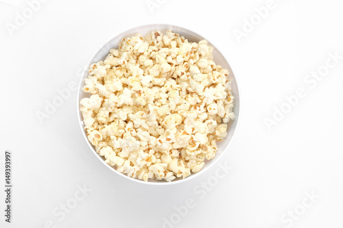 Popcorn in the bowl on white background - Soft focus