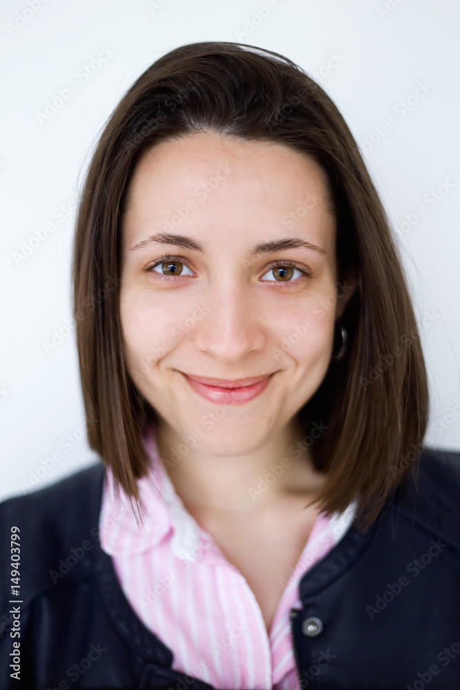 Beautiful young woman looking at camera. Isolated on white. Beautiful young woman looking at camera. Isolated on white.