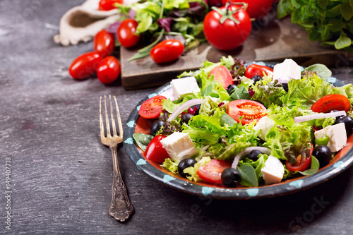 plate of fresh salad with vegetables