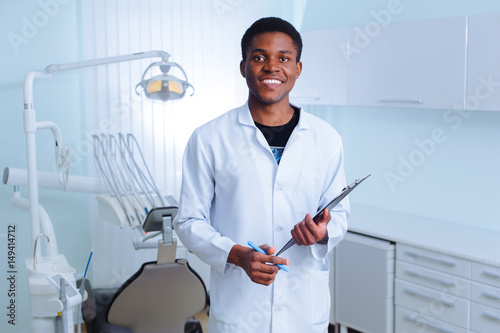 Black dentist in a dental clinic