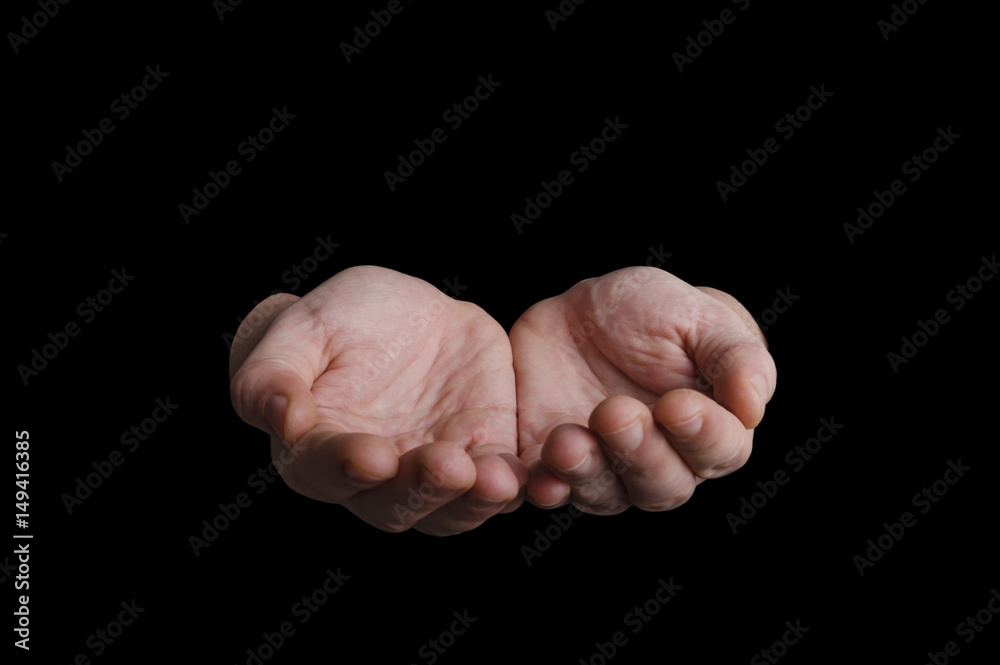 Open hands isolated on black background selective focus on palm Open hands isolated on black background selective focus on palm