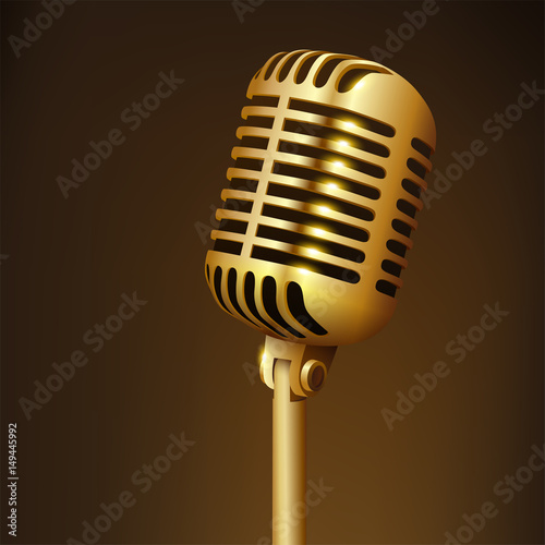 Vintage golden studio microphone isolated on dark background