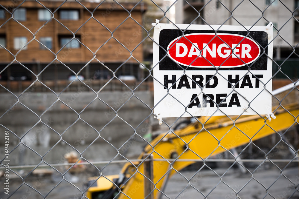 Danger/No Tresspassing Sign at a Construction Site Danger/No Tresspassing Sign at a Construction Site