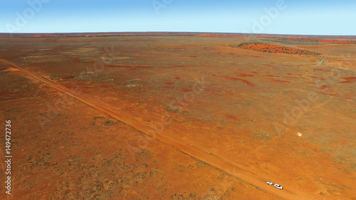 Cordillio Downs Road - lonely vehicle Australian Outback photo