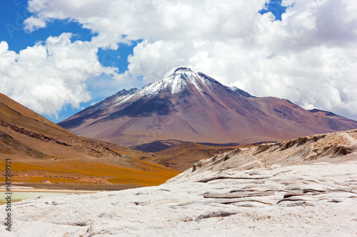 Mountain terrain of San Pedro de Atacama, Chile, South America. Colorful landscape with volcanic mountain snow peak.