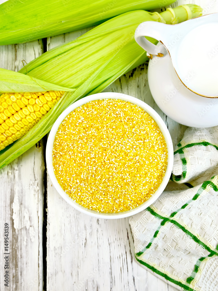 Corn grits in white bowl on board top StockFoto Adobe Stock