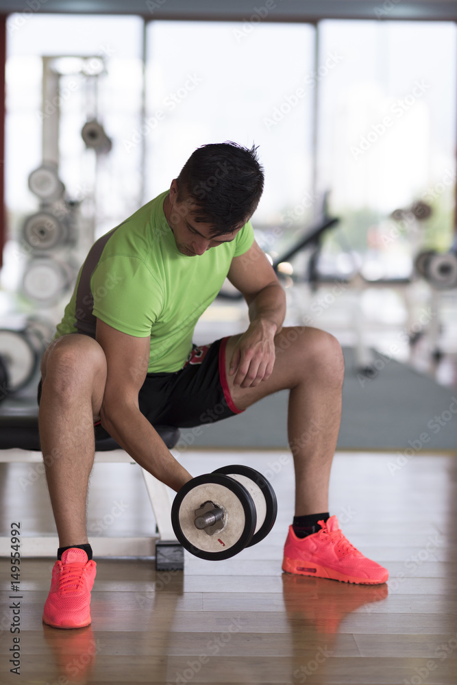 handsome man working out with dumbbells handsome man working out with dumbbells