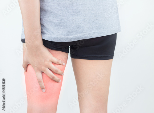 Young woman with pulled hamstring. Hamstring pain after sport playing.