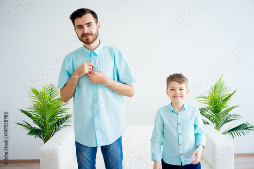 Father and son dress together photo