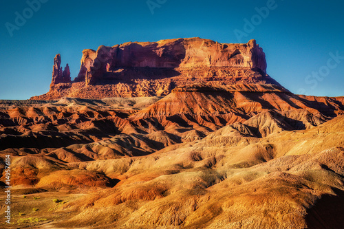 A Butte and Badlands at Sunset photo