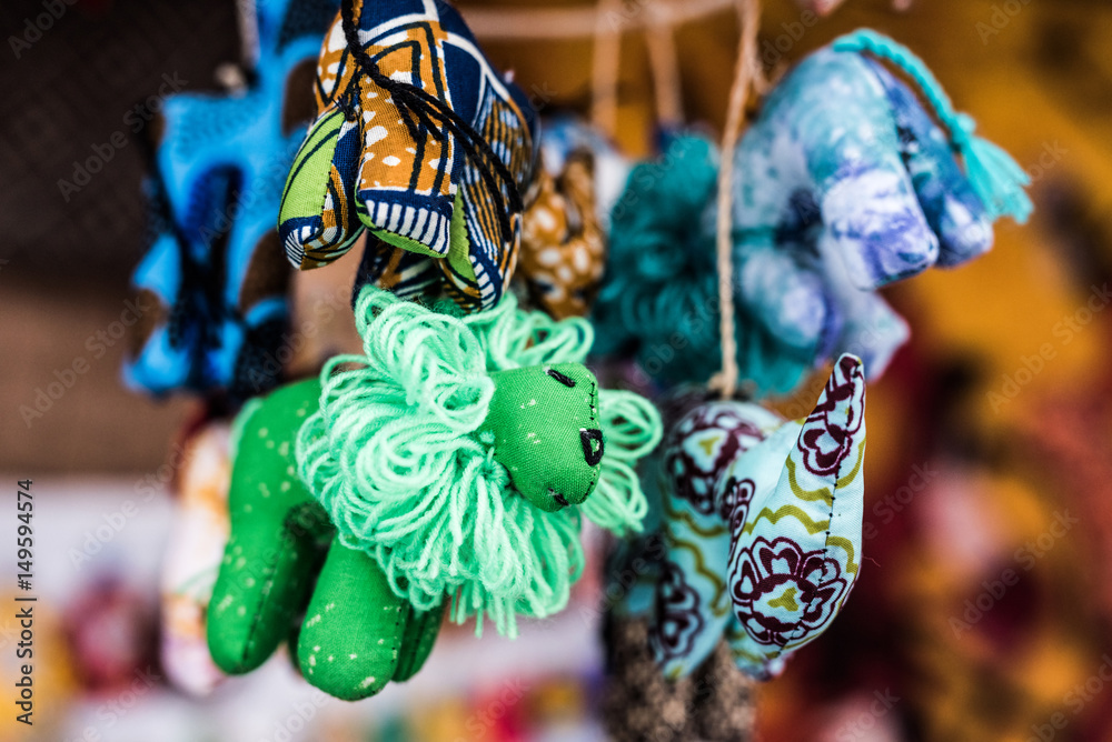 colorful sewn fabric toys at african souvenir market