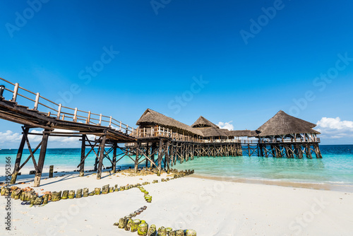 colorful landscape with african hotel in sea on the pier, Zanzibar