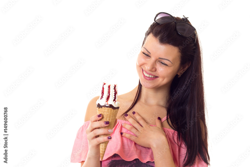 Woman in dress with sunglasses holding ice-cream Woman in dress with sunglasses holding ice-cream