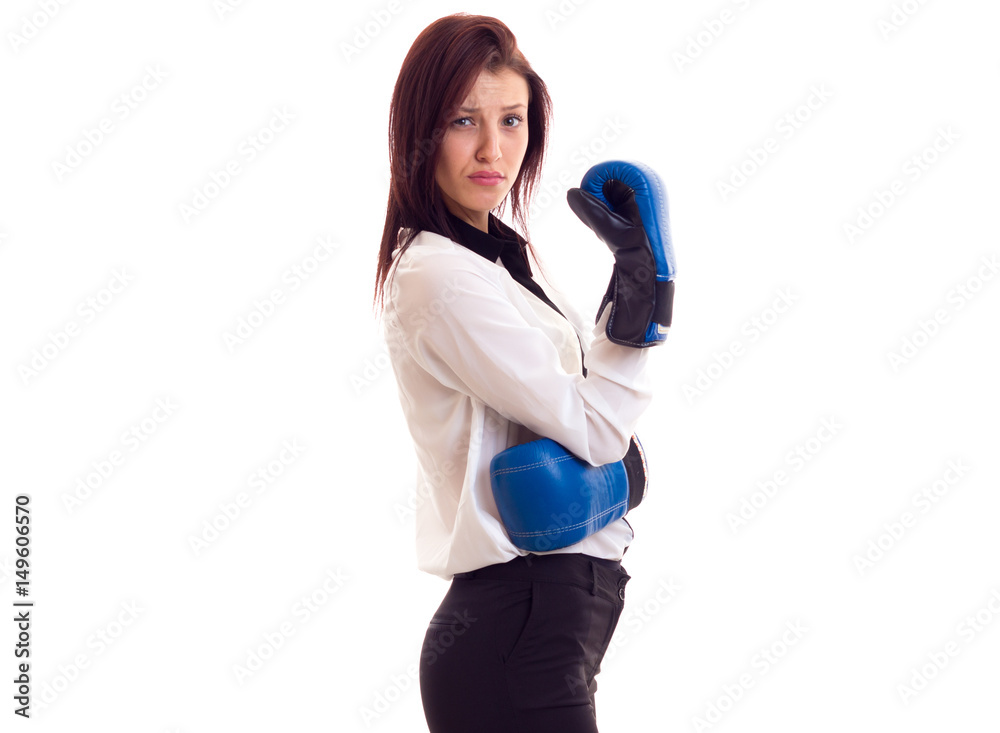 Young businesswoman in boxing gloves Young businesswoman in boxing gloves