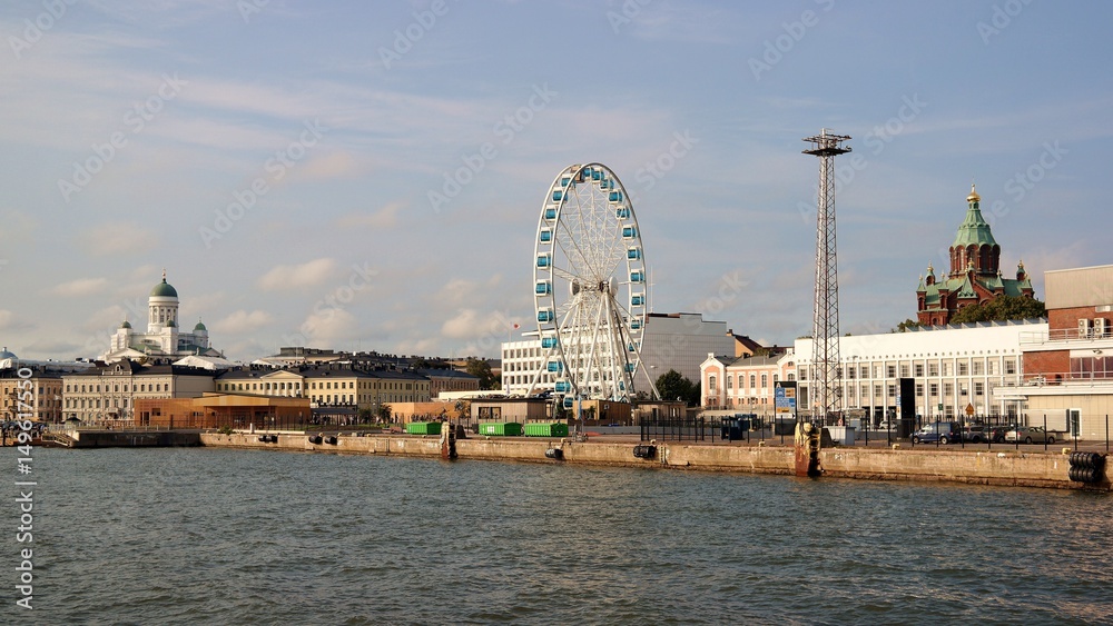 Panorama of Helsinki with Tuomiokirrko and Uspenski cathedrals and ferris wheel