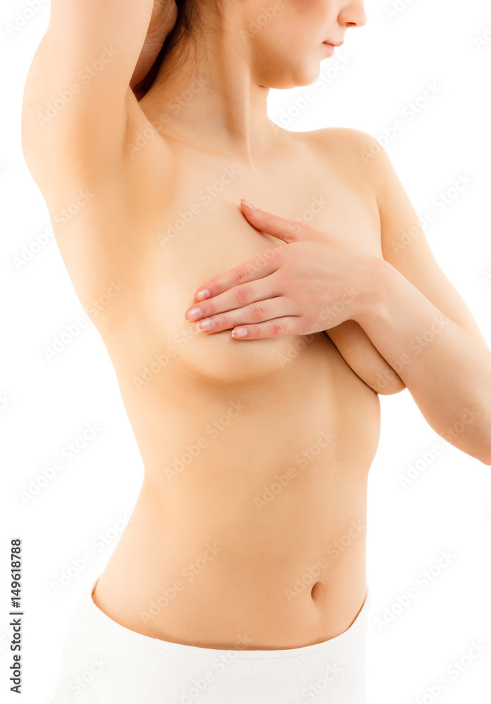 Fototapeta premium Woman examining her breast isolated on white background