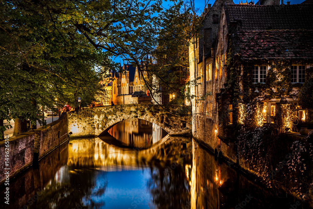 Night view of Bruges city, Belgium, nightshot of Brugge canals, traditional belgium architecture