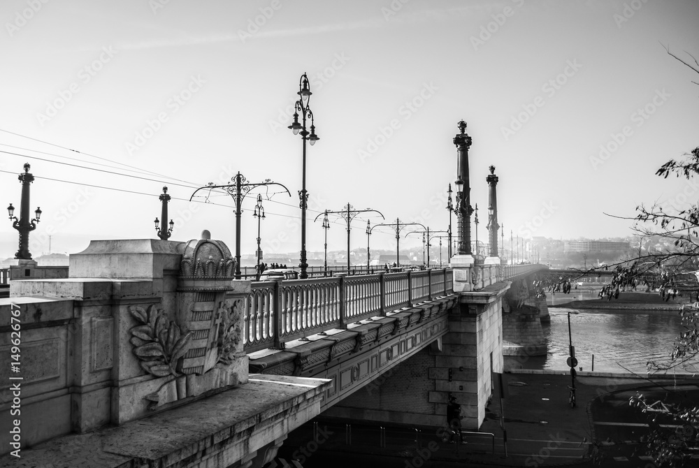 Budapest, Hungary - December 31, 2016: Margaret bridge with tram, winter sunny day