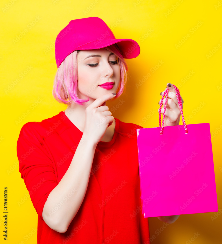 young woman with shopping bag young woman with shopping bag