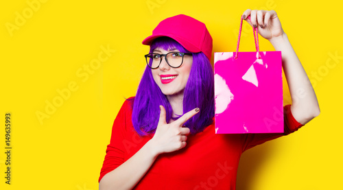 young woman with shopping bag