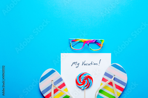 paper My Vacation, glasses, lollipop and sandals photo