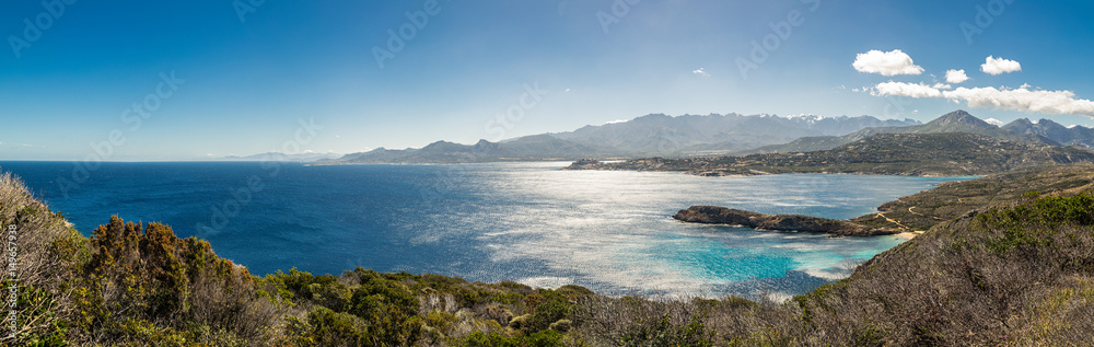 Panoramic of Calvi citadel and mountains from Revellata in Corsica