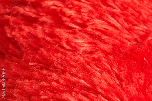 Red fabric texture. Red cloth background. Close up view of red fabric texture and background. Abstract background and texture