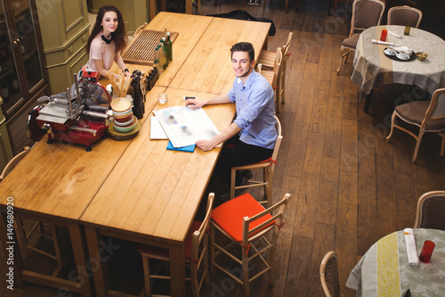 Young couple spending time at home in the kitchen