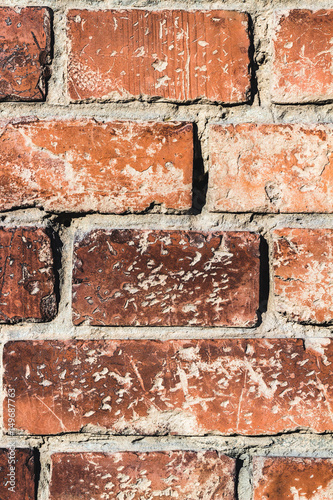 Old orange brick wall texture, close-up, background
