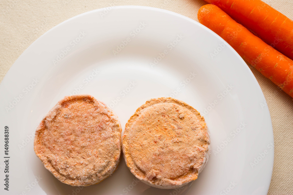 Carrot cutlets on a white plate. The concept of a healthy diet. Vegetarian cuisine. Carrot cutlets on a white plate. The concept of a healthy diet. Vegetarian cuisine.