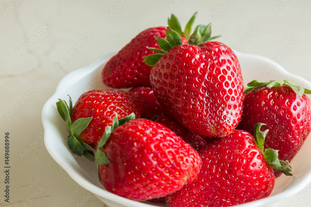 Large and juicy strawberries. Tasty and ripe berries. Seasonal delicacy. Large and juicy strawberries. Tasty and ripe berries. Seasonal delicacy.