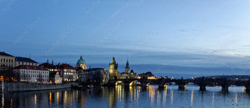 Fototapeta premium Night view of the town from the riverside