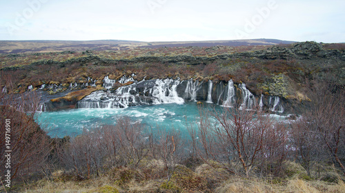 hraunfossar horizontal waterfall in Icealand. Beautiful and majestic landscape tourist attraction place photo