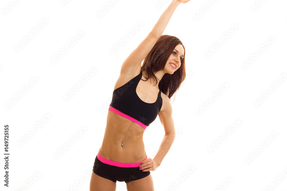athletic girl in black top and panties makes exercise athletic girl in black top and panties makes exercise