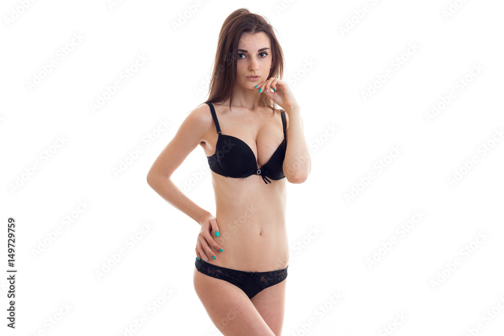 charming young girl with beautiful body stands in black underwear charming young girl with beautiful body stands in black underwear
