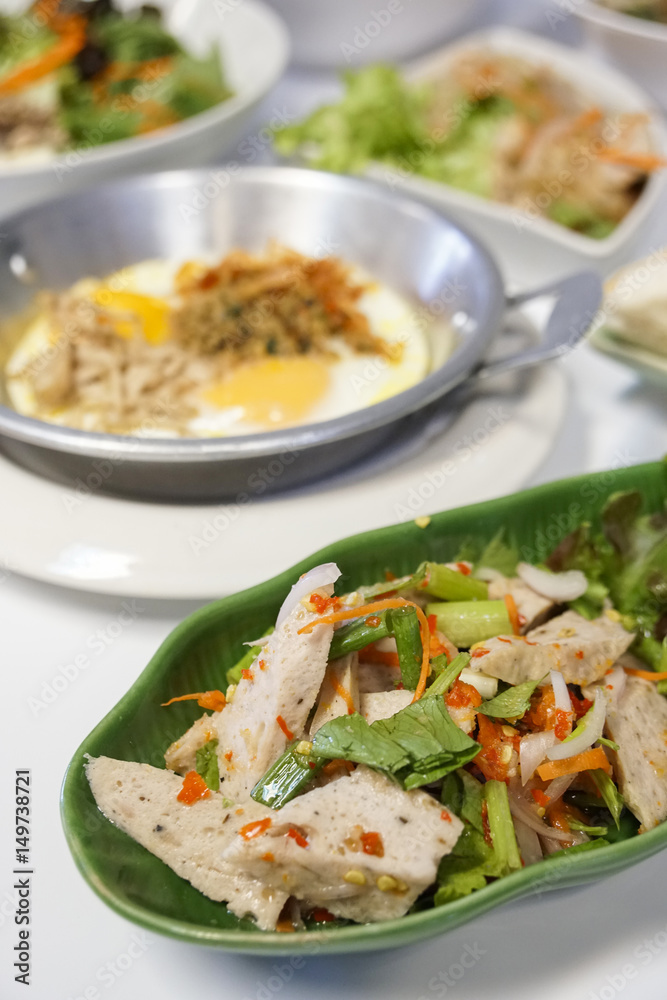 Preserved pork sausage spicy salad on white background. Food Thailand Preserved pork sausage spicy salad on white background. Food Thailand