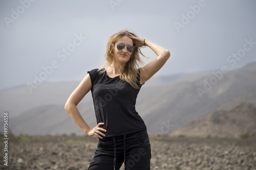 young woman in the landscape of Hajjar Mountains in Oman