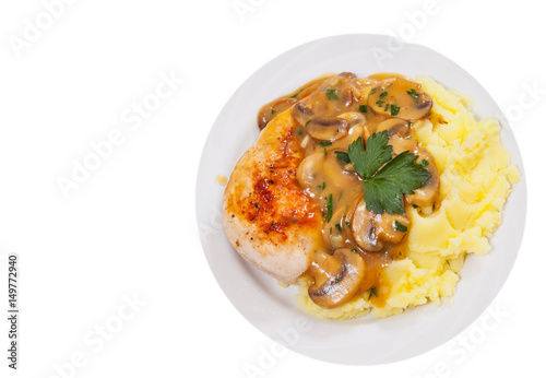 Chicken Breast with Mushroom Sauce and mashed potato. top view. isolated on white