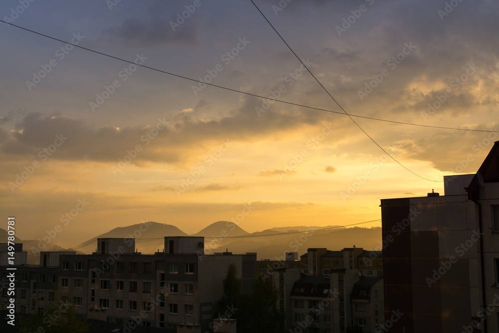 Sunrise and sunset over the buildings in the Zilina city. Slovakia Sunrise and sunset over the buildings in the Zilina city. Slovakia