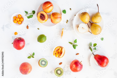 Fototapeta Naklejka Na Ścianę i Meble -  Fresh fruits on white background. Summer fruits. Flat lay, top view