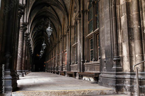 The inner courtyard of the town hall with beautiful architecture, an old corridor with blackened columns