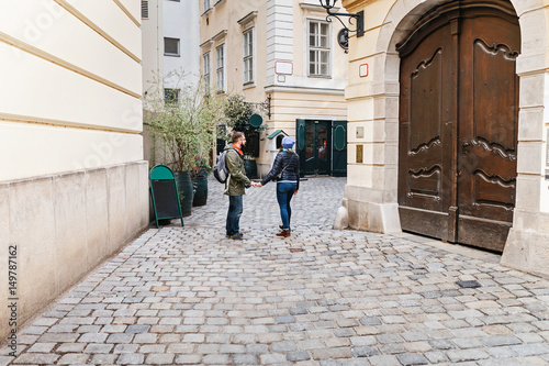 Romantic couple tourist walking together in Europe narrow street © EdNurg