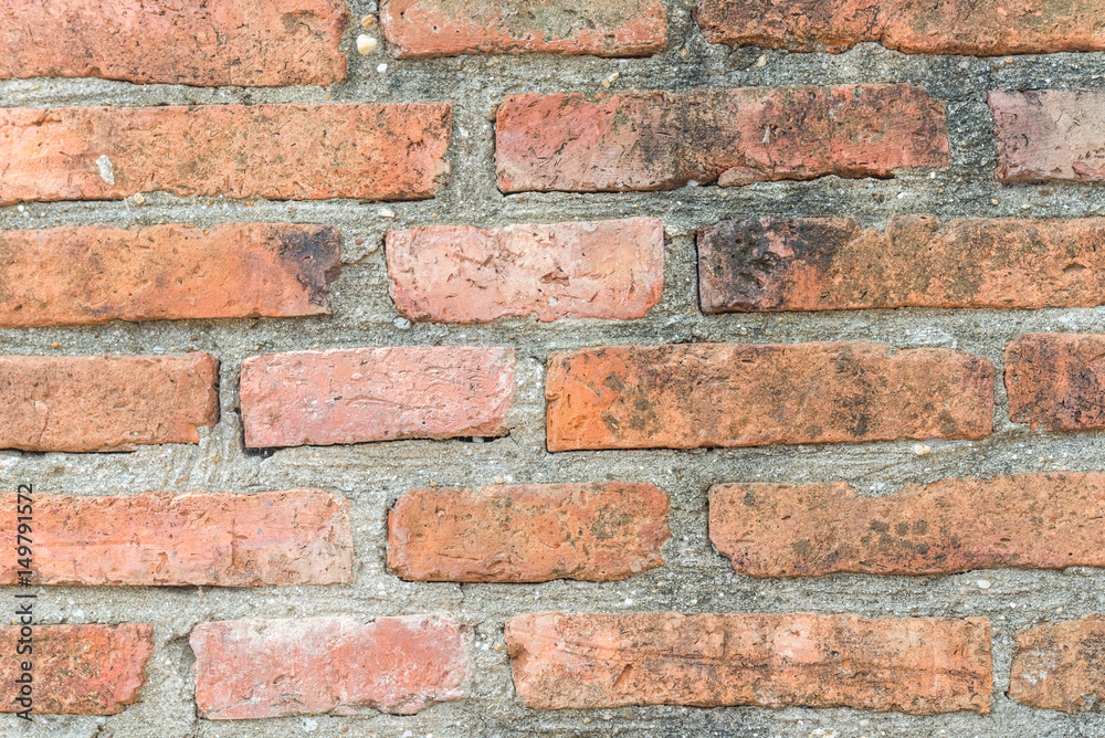 Naklejka premium Orange Brick. wall background. wallpaper.