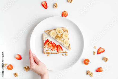 fitness breskfast with homemade sandwiches white table background top view photo