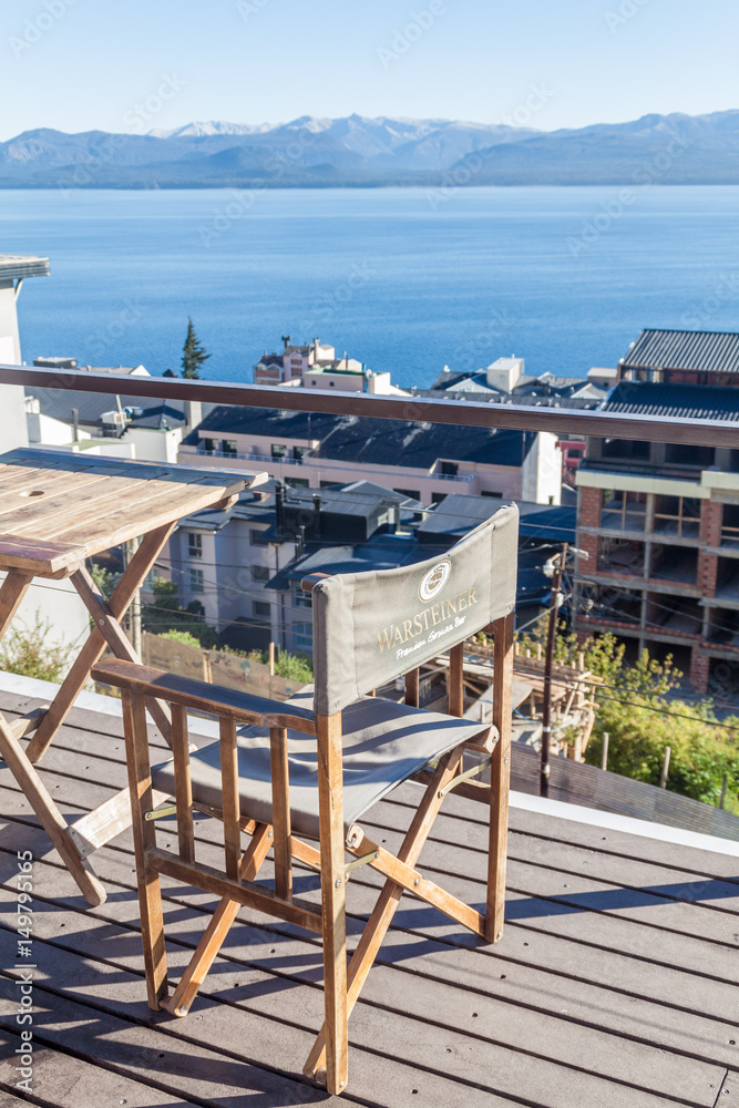 SAN CARLOS DE BARILOCHE, ARGENTINA - MARCH 18, 2015: View of Nahuel Huapi lake from a terrace in Bariloche, Argentina. SAN CARLOS DE BARILOCHE, ARGENTINA - MARCH 18, 2015: View of Nahuel Huapi lake from a terrace in Bariloche, Argentina.