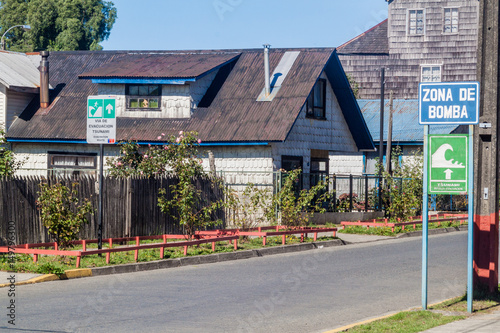Tsunami Hazard Zone Signs in Curaco de Velez village, Chile