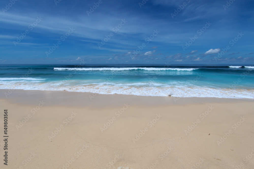 bkue beach with white sand in Bukit area, Bali.