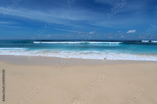Fototapeta Naklejka Na Ścianę i Meble -  bkue beach with white sand in Bukit area, Bali.