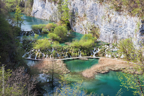 Cascade waterfalst and tourist path in Plitvice Lakes National Park, Croatia