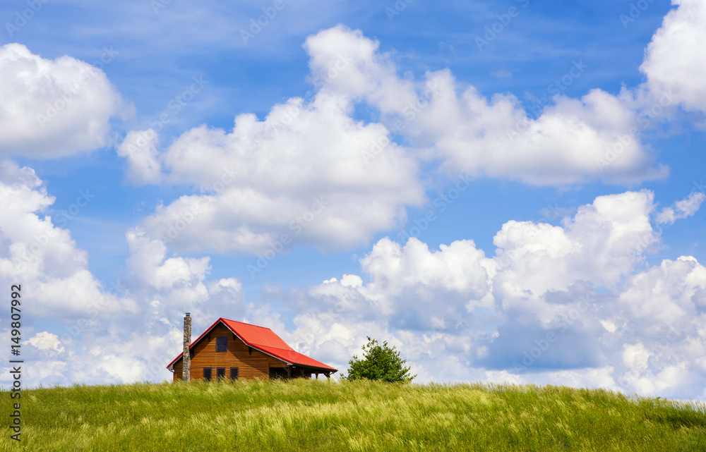 Cabin with Red Roof on a Hill in the Country Cabin with Red Roof on a Hill in the Country